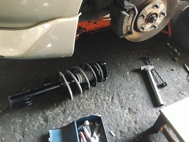 Car suspension problems, car shock absorber and coil.