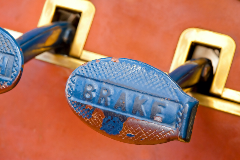 worn brake pedal on a vintage automobile
