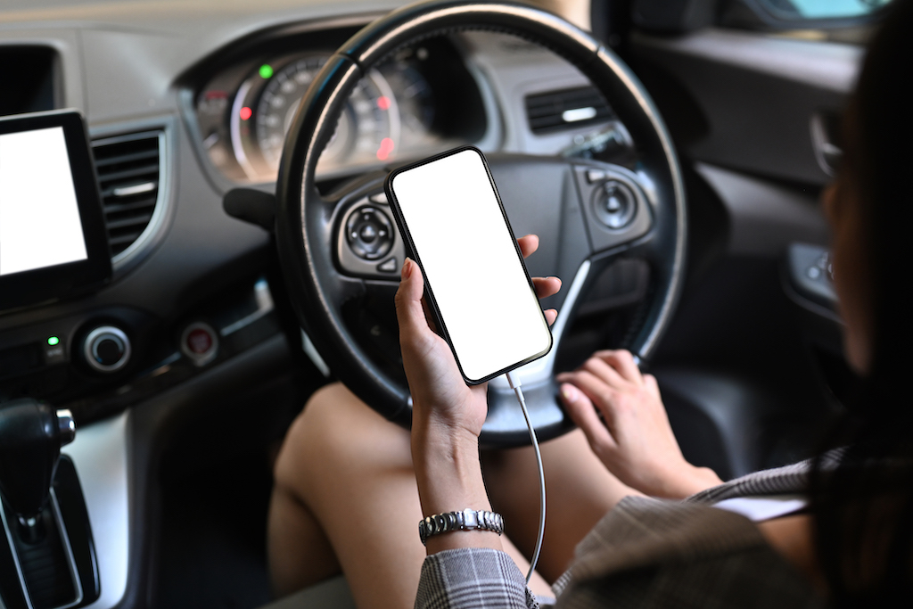 Smart car accessories, charging phone in car.