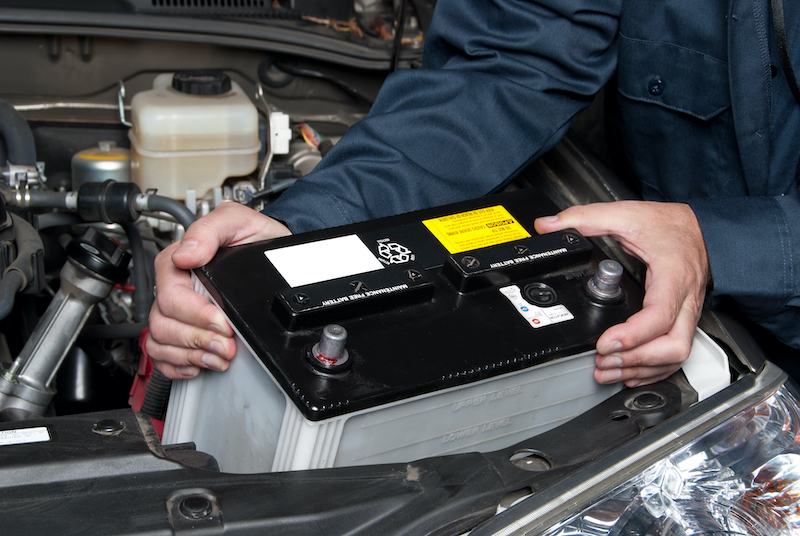 Summer car care tips, replacing car battery.